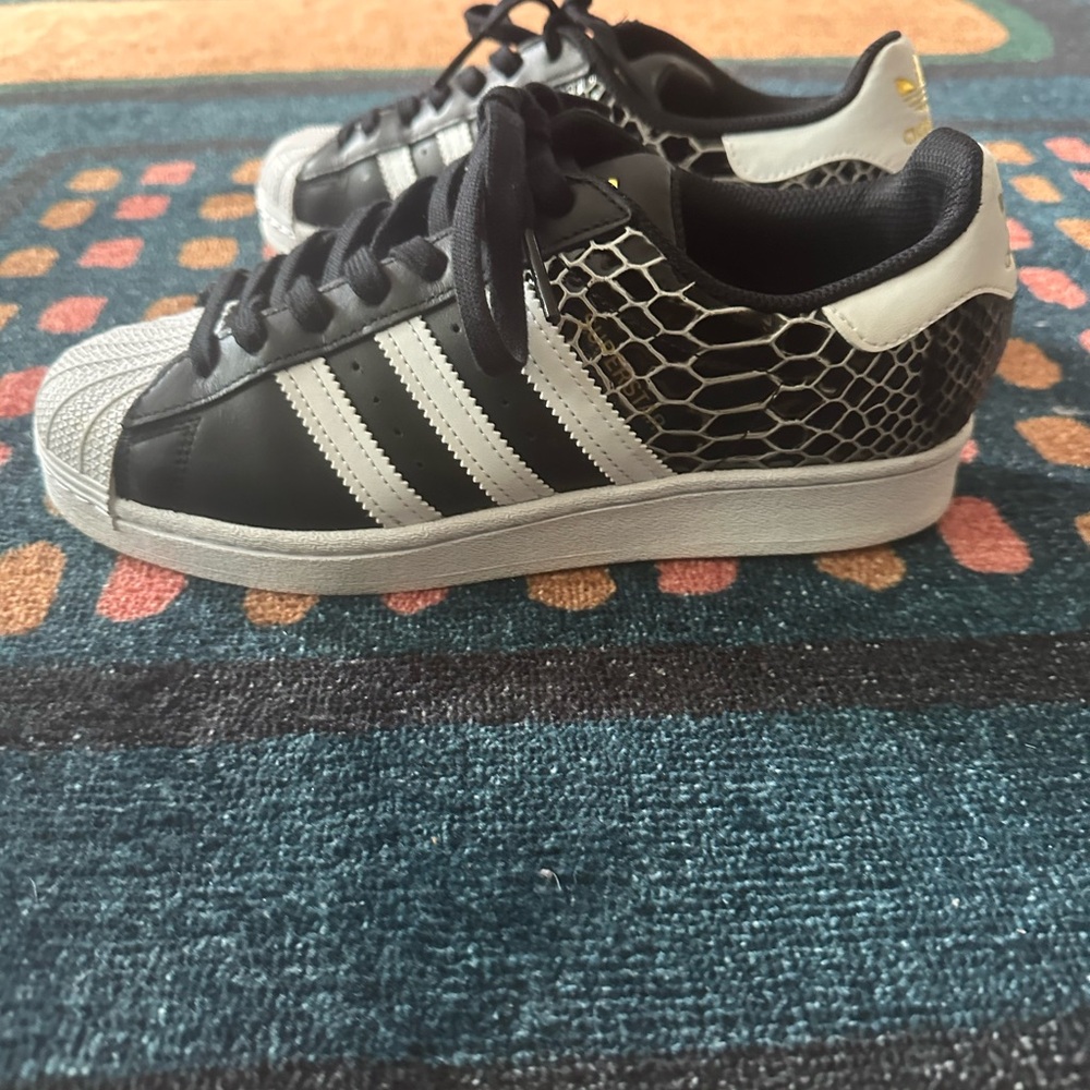 Gently Used Adidas Black and White Sneakers with Gold Accent